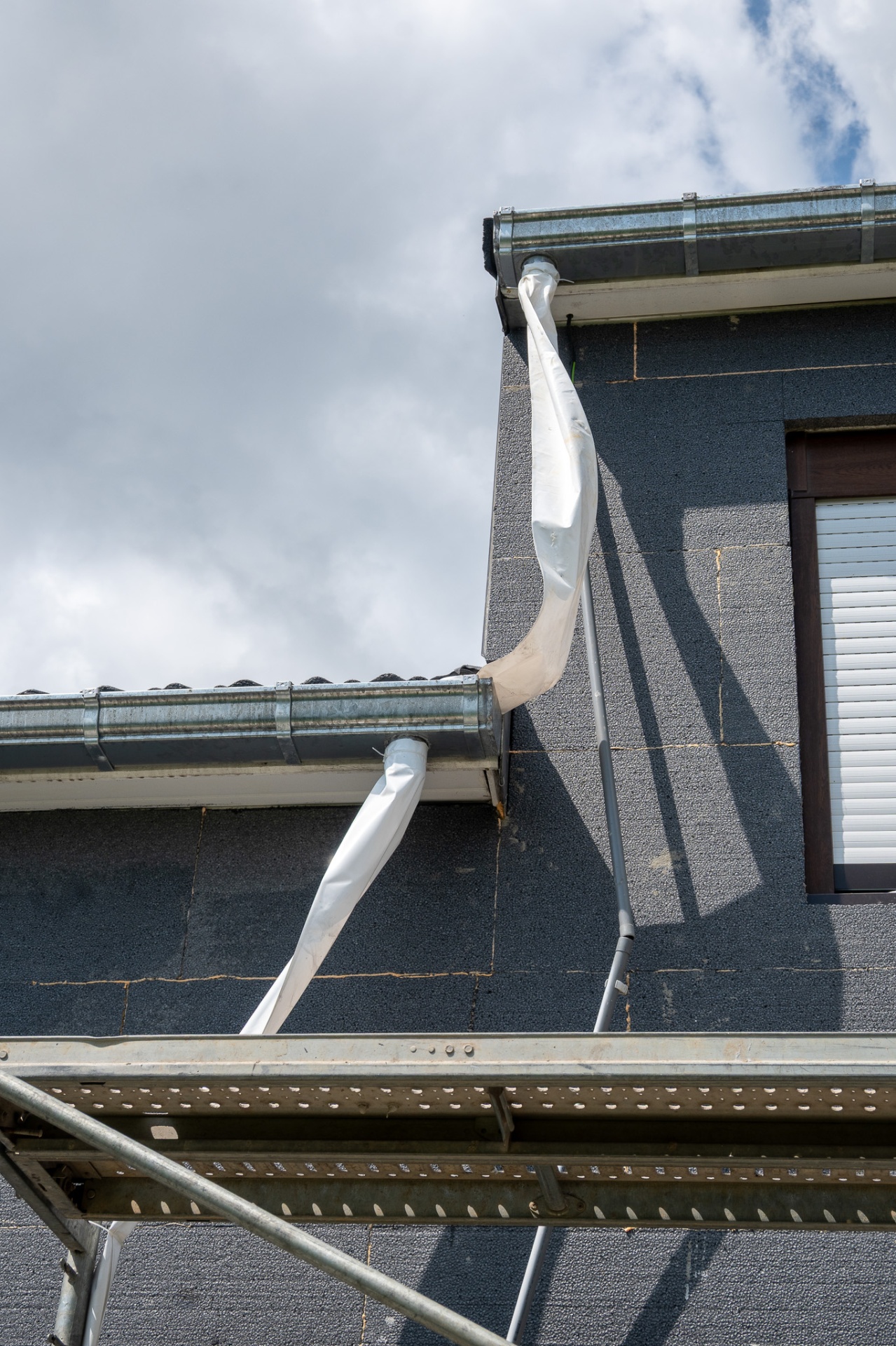 Pose de l'isolant extérieur sur façade